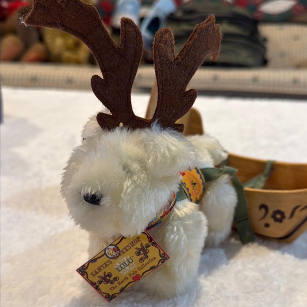 Lulu dog with Muffy wooden sled